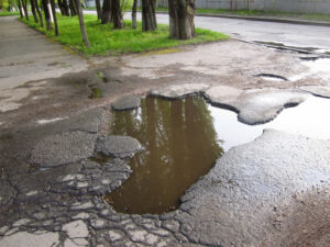 Cracks and puddles on driveway 